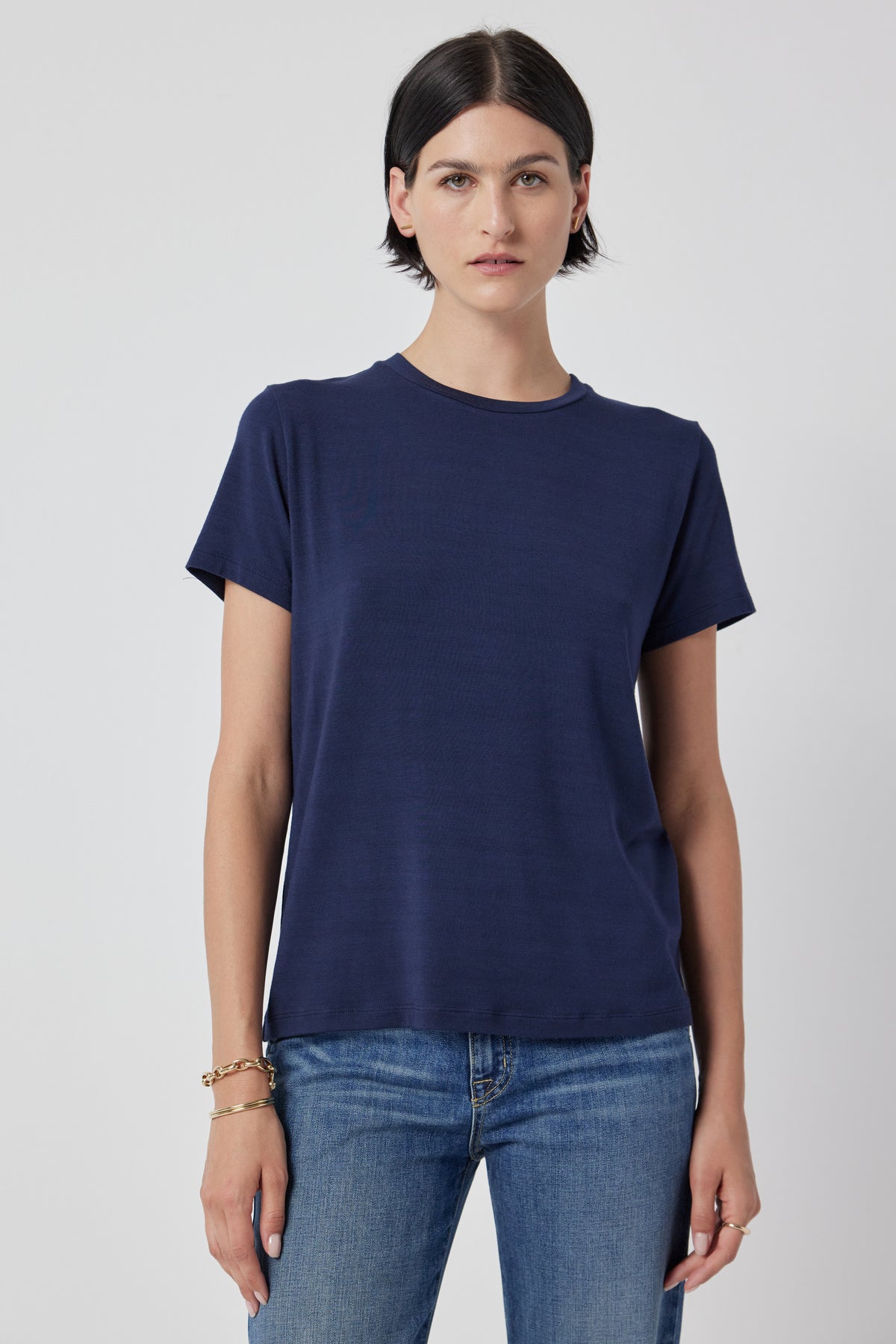 Woman wearing a SOLANA TEE by Velvet by Jenny Graham and jeans.-36463663841473