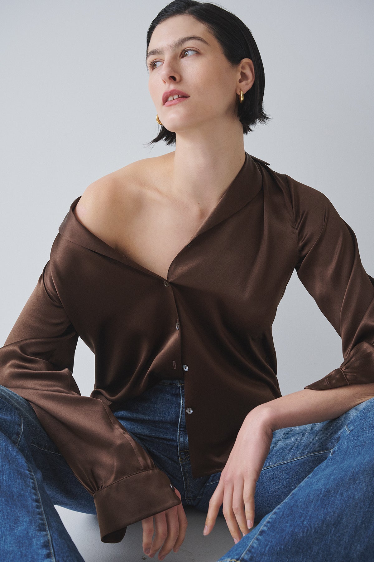 A model wearing a timeless SOHO TOP silk charmeuse blouse by Velvet by Jenny Graham.-35547968438465