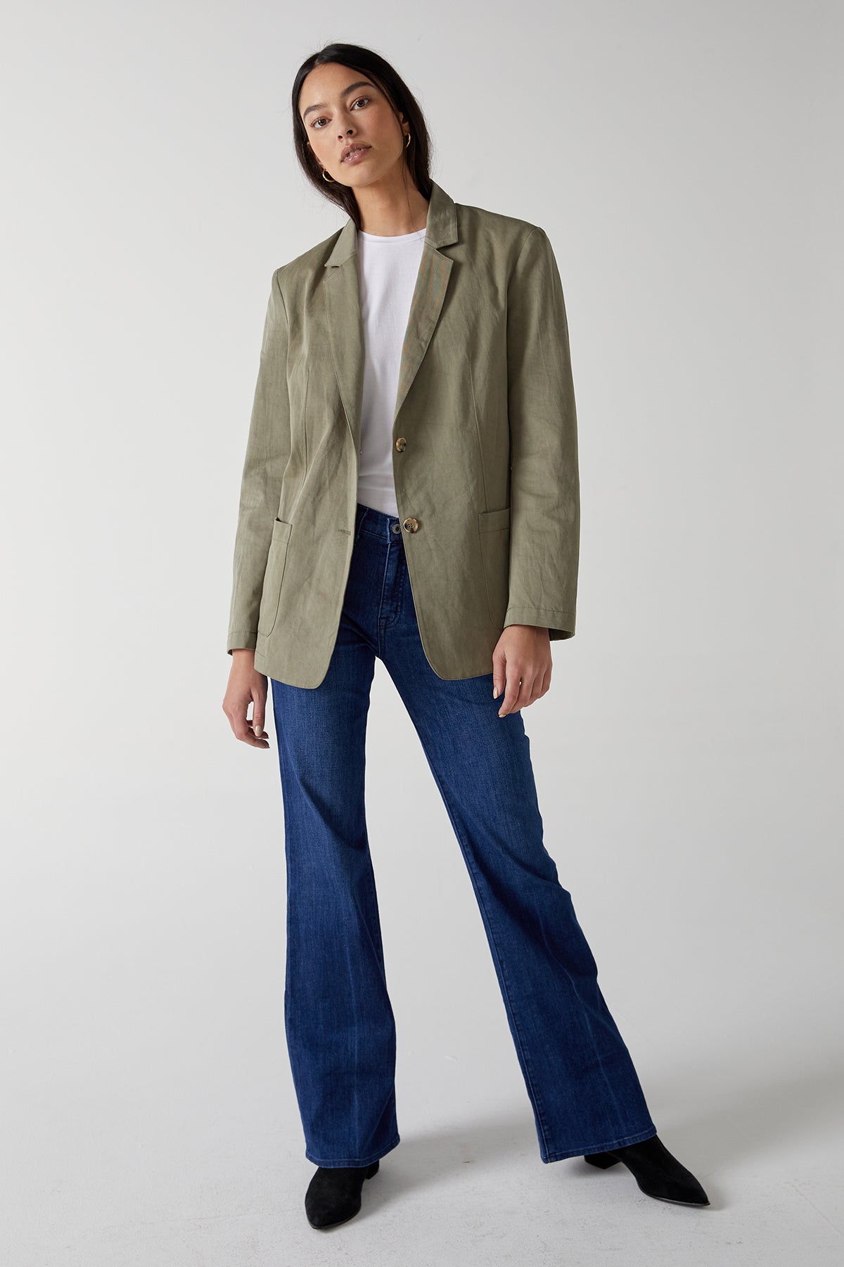 The model is wearing a ECHO BLAZER by Velvet by Jenny Graham and flared jeans.-25316070686913